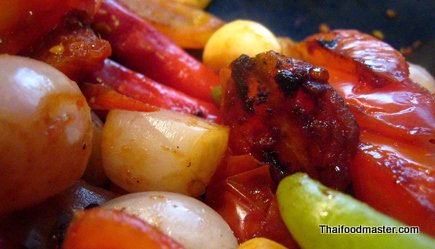 Grilled Pork Marinated in Garlic, Coriander and Pepper Served with Spicy Hot and Sour Tomato Relish