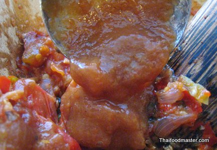 Grilled Pork Marinated in Garlic, Coriander and Pepper Served with Spicy Hot and Sour Tomato Relish